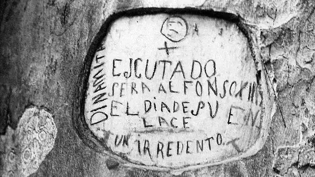 Grabado en un árbol del Retiro anunciando el atentado contra Alfonso XIII